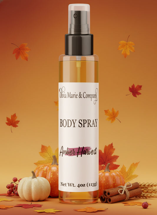 Body spray bottle labeled 'Olivia Marie & Company' on a marble background