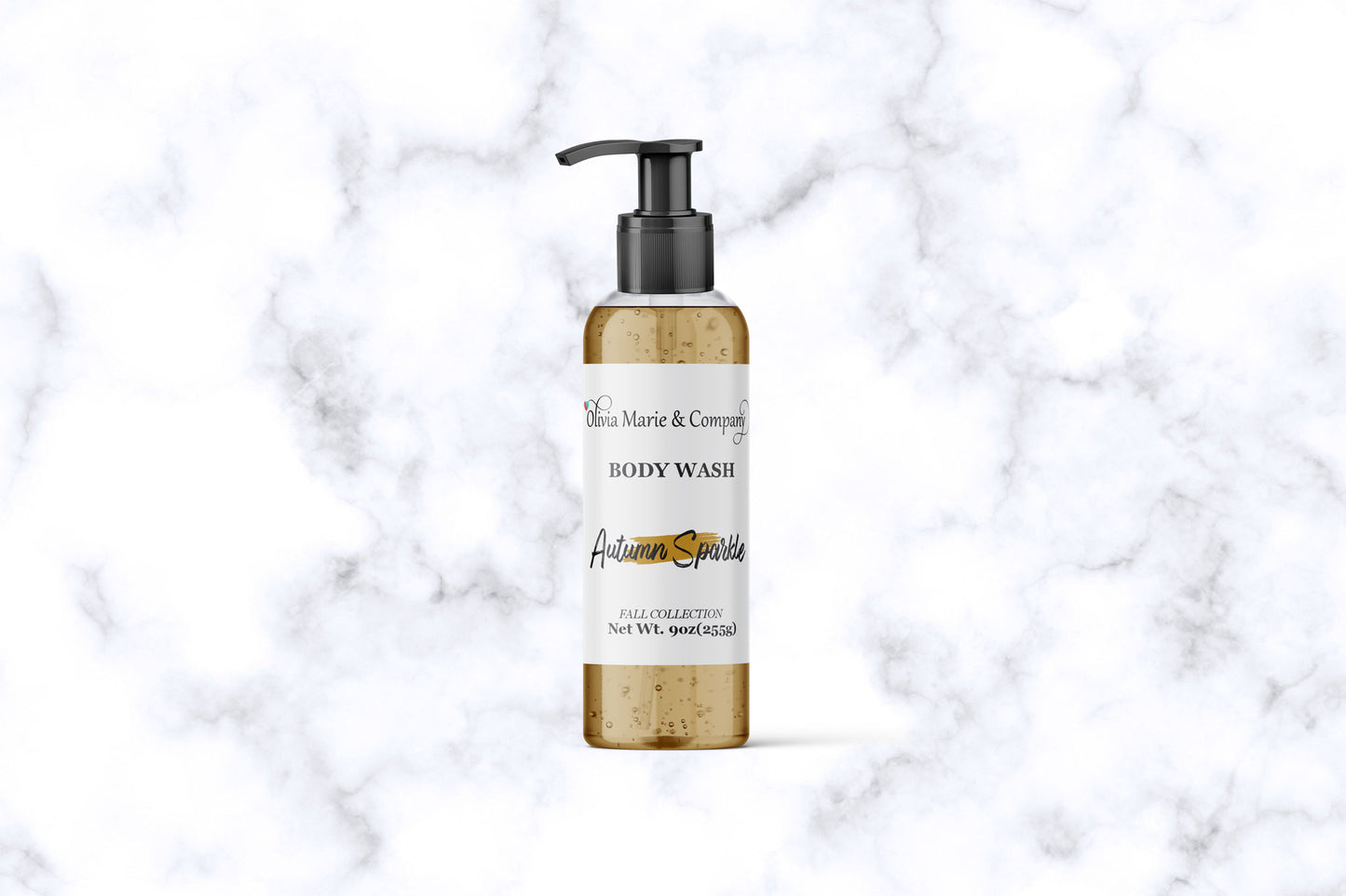 Body wash bottle with pump on a marble background