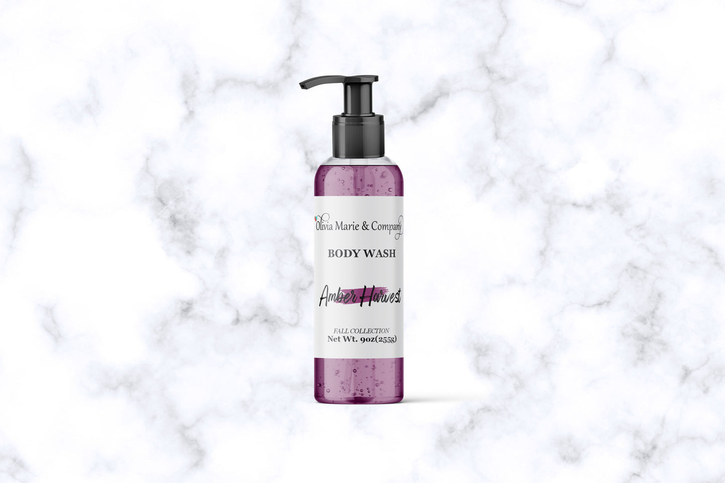 Body wash bottle with pump on a marble background