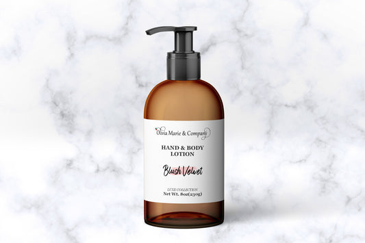 Hand and body lotion bottle with pump on a marble background