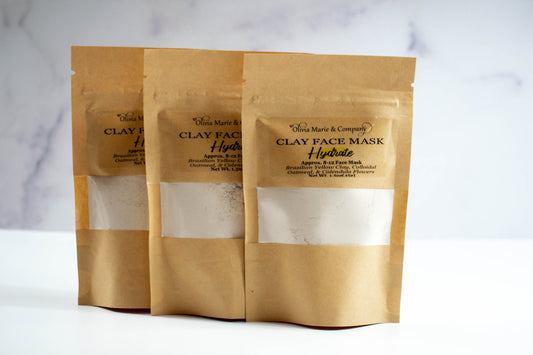 Yellow clay mask in brown bag with clear window.