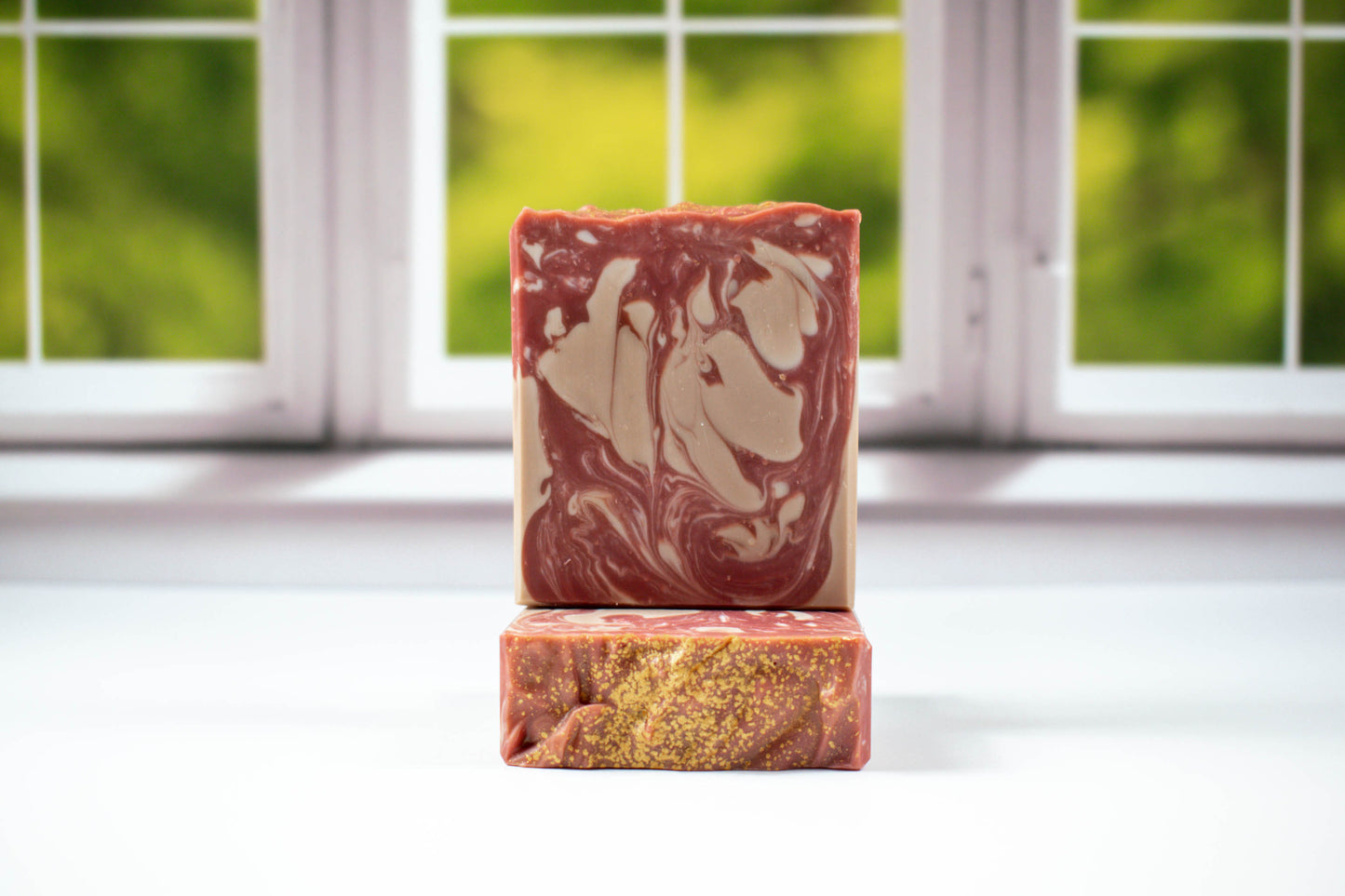 Soap with a swirl in a reddish brown and tan color. 