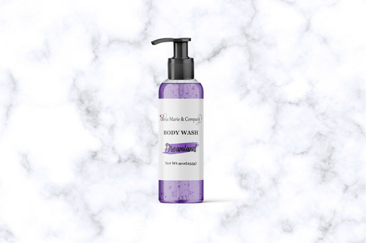 Dreamland body wash with a light purple liquid in a clear bottle