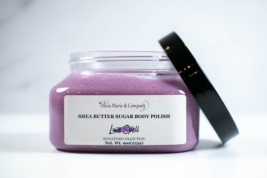 Love Spell sugar scrub in clear jar with scrub colored purple